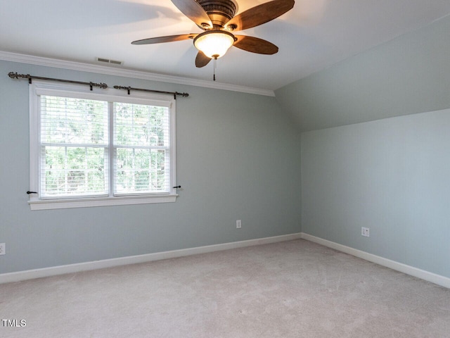 bonus room featuring visible vents, baseboards, light colored carpet, lofted ceiling, and a ceiling fan