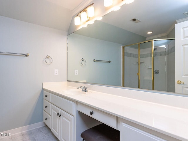 full bath with visible vents, a shower stall, vanity, and baseboards