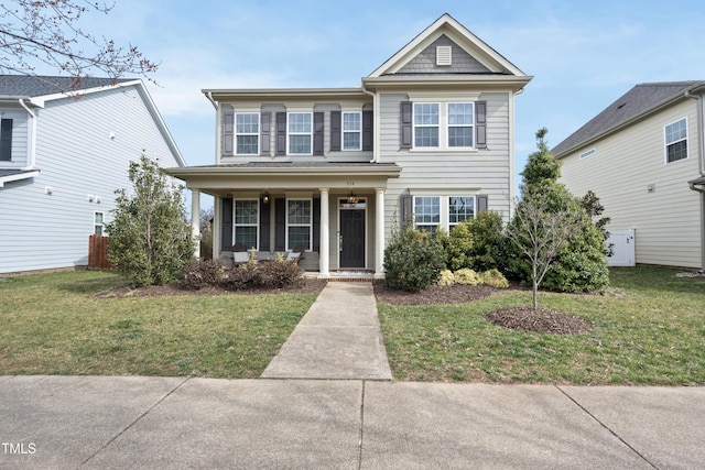 view of front of home featuring a porch and a front yard