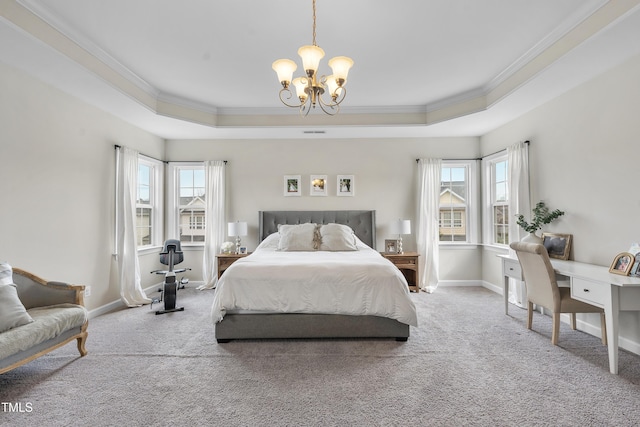 carpeted bedroom with multiple windows, a raised ceiling, and crown molding