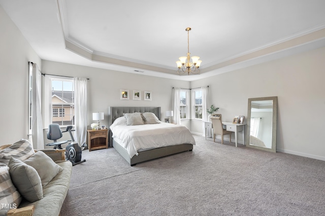 bedroom with carpet, baseboards, an inviting chandelier, a tray ceiling, and crown molding