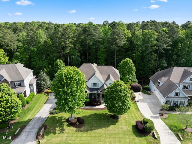 aerial view with a view of trees and a residential view