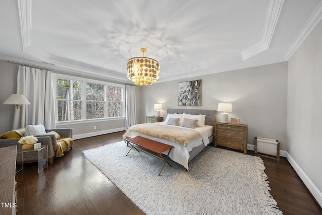 bedroom with an inviting chandelier, crown molding, baseboards, and dark wood-style flooring