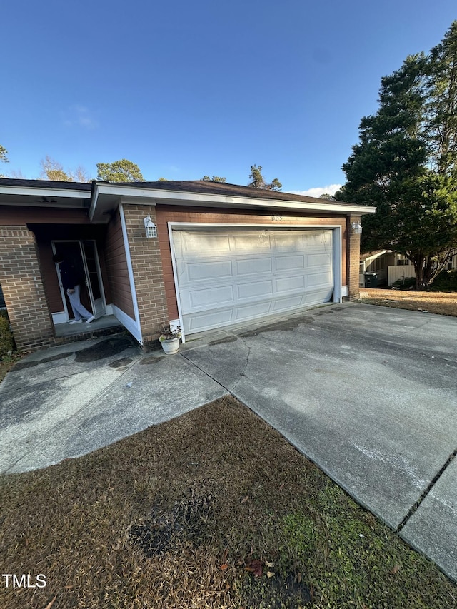 garage with driveway