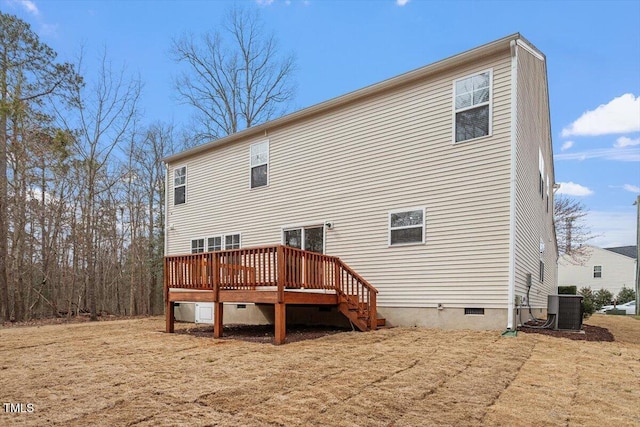 back of house featuring crawl space, central AC unit, and a wooden deck