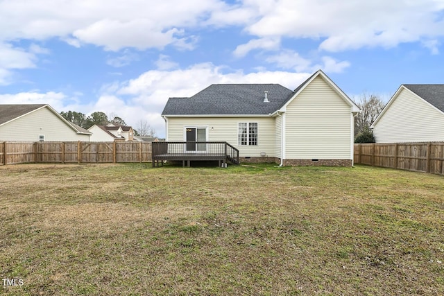 back of house featuring a wooden deck, crawl space, a yard, and a fenced backyard