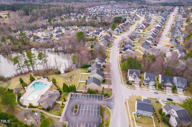 aerial view featuring a residential view and a water view