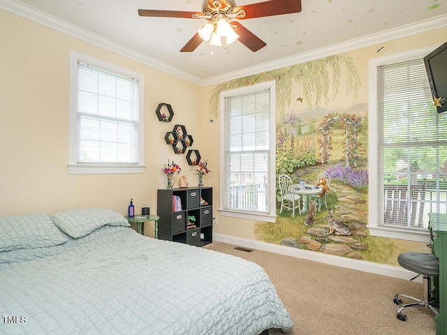 506 Wildwood Ln, Graham, NC 27253 - carpeted bedroom with ornamental molding, multiple windows, baseboards, and a ceiling fan