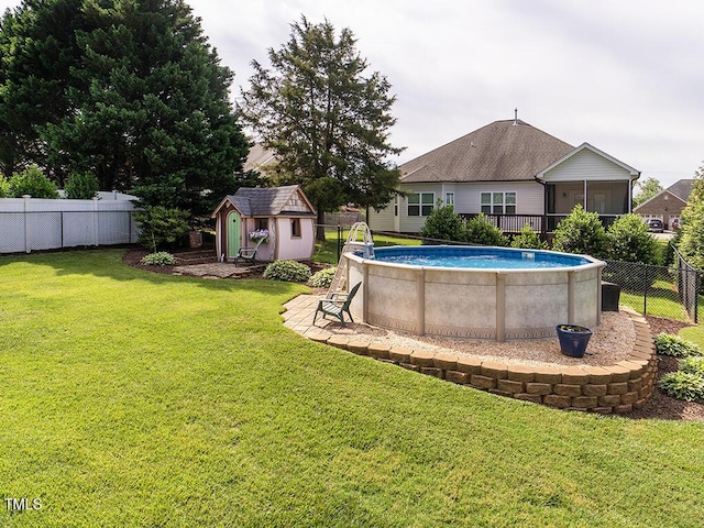 506 Wildwood Ln, Graham, NC 27253 - view of swimming pool with a storage unit and an outbuilding
