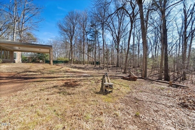 view of yard featuring a carport