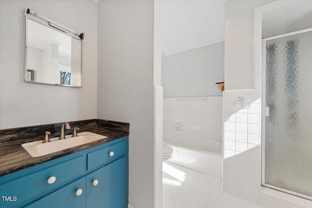 bathroom with tile patterned floors, an enclosed shower, toilet, a bathtub, and vanity