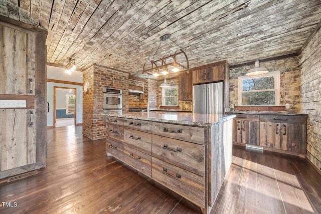 kitchen with wood ceiling, high end refrigerator, stone counters, brown cabinets, and dark wood-style flooring