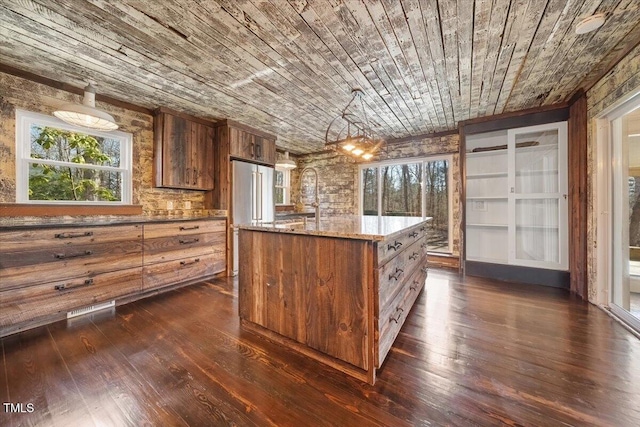 kitchen with plenty of natural light, wooden ceiling, and dark wood finished floors