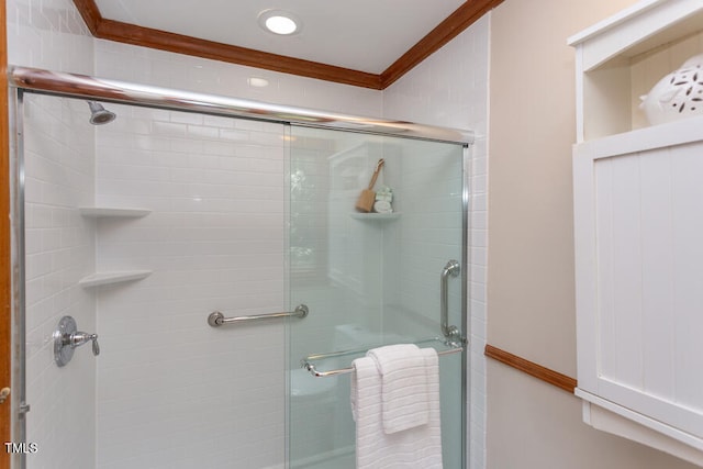 full bath featuring a stall shower and ornamental molding