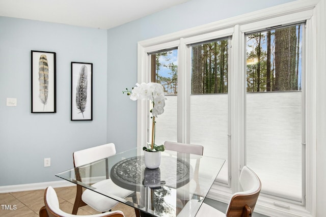 tiled dining area with baseboards