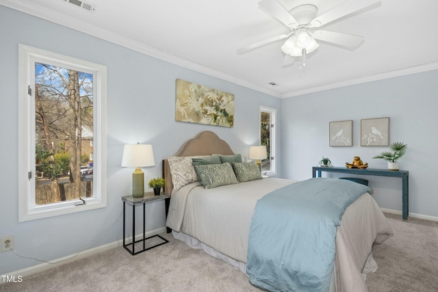 bedroom featuring baseboards, multiple windows, carpet, and ornamental molding