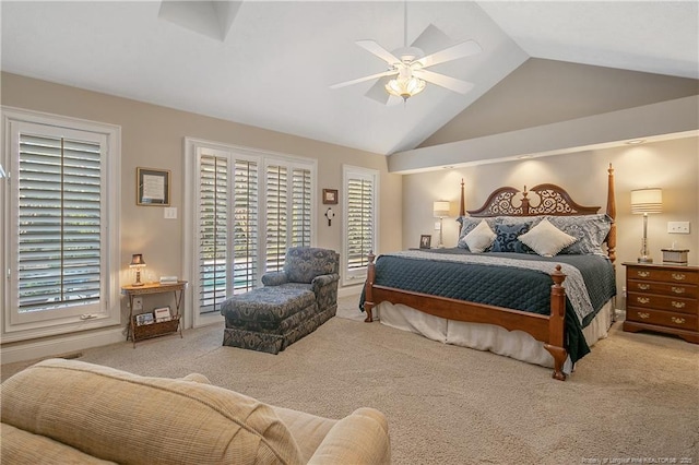 bedroom with carpet floors, ceiling fan, vaulted ceiling, and access to outside