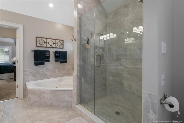 full bath with a shower stall, a garden tub, and ensuite bathroom