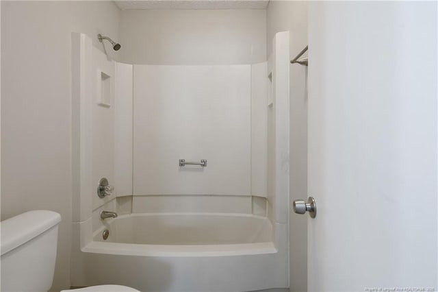 full bathroom featuring toilet and shower / tub combination