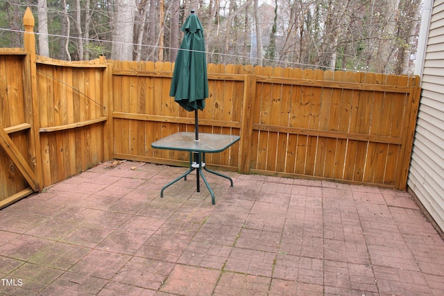 view of patio with fence