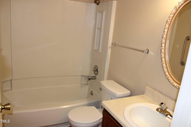 bathroom with vanity, toilet, and shower / tub combination