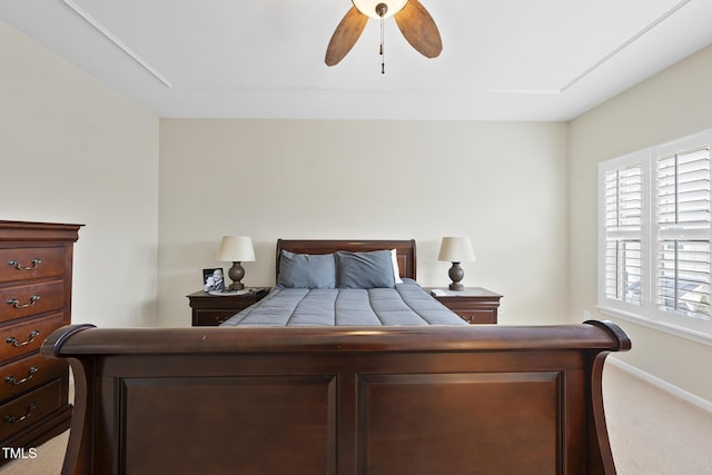 bedroom featuring baseboards, carpet floors, and ceiling fan