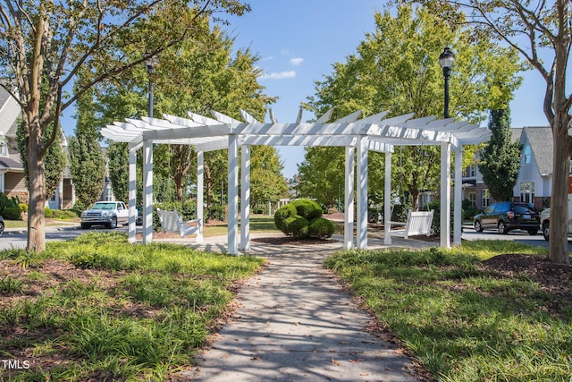 view of property's community featuring a pergola