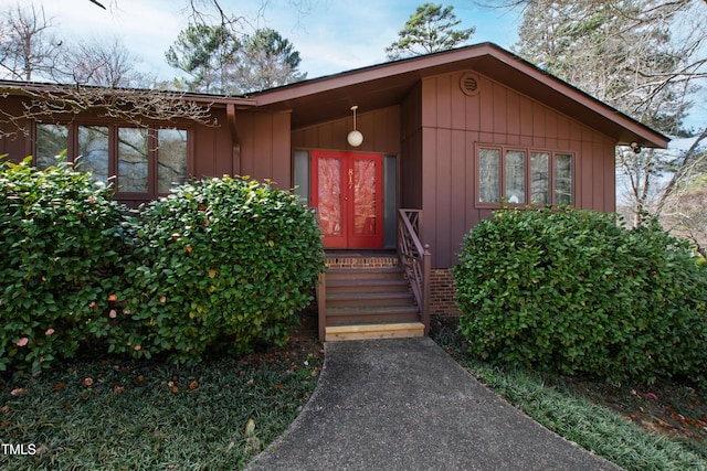 entrance to property with board and batten siding