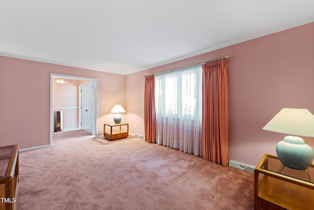 interior space featuring carpet flooring, visible vents, and baseboards