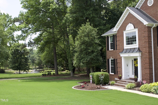 2514 Mcgowan Ct, Wake Forest, NC 27587 - view of green lawn with view of wooded area
