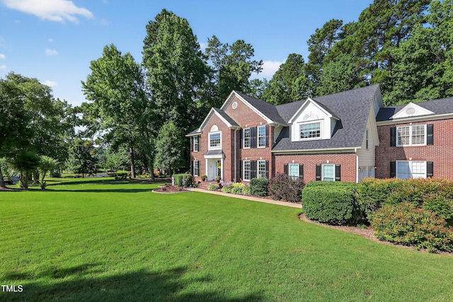 2514 Mcgowan Ct, Wake Forest, NC 27587 - colonial inspired home featuring brick siding and a front lawn