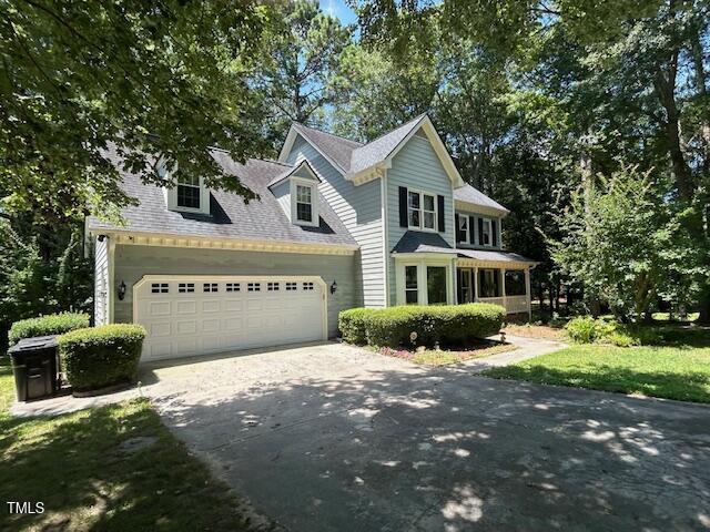 1501 Ramson Ct, Raleigh, NC 27603 - view of front of property featuring driveway and a garage