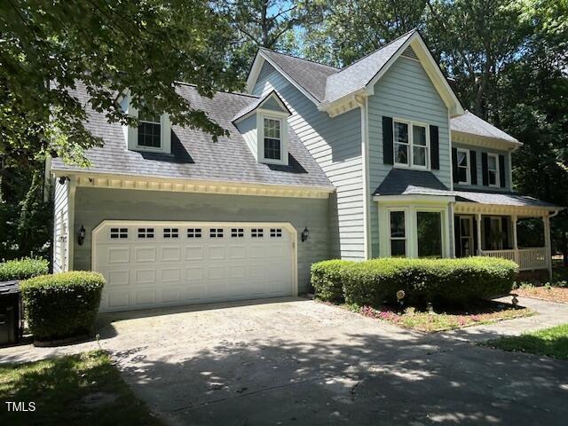 1501 Ramson Ct, Raleigh, NC 27603 - view of front of house featuring concrete driveway and an attached garage