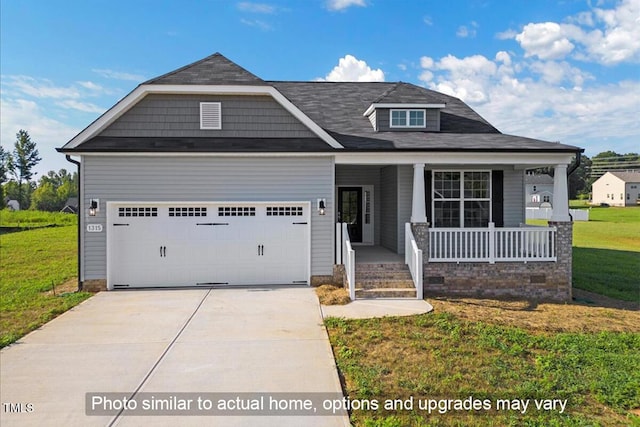 view of front facade featuring a garage, a porch, driveway, and a front yard