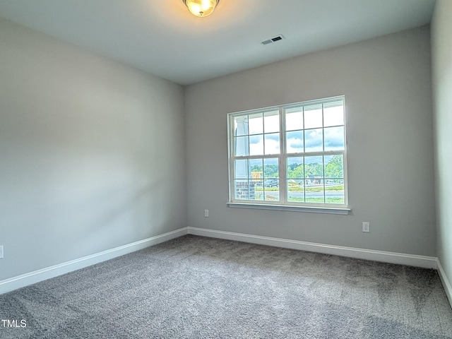 1794 Parham Dr, Graham, NC 27253 - carpeted spare room with baseboards
