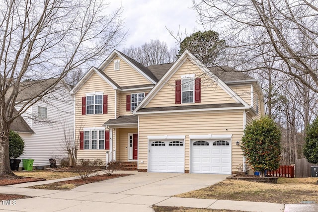 view of front of home featuring an attached garage and concrete driveway