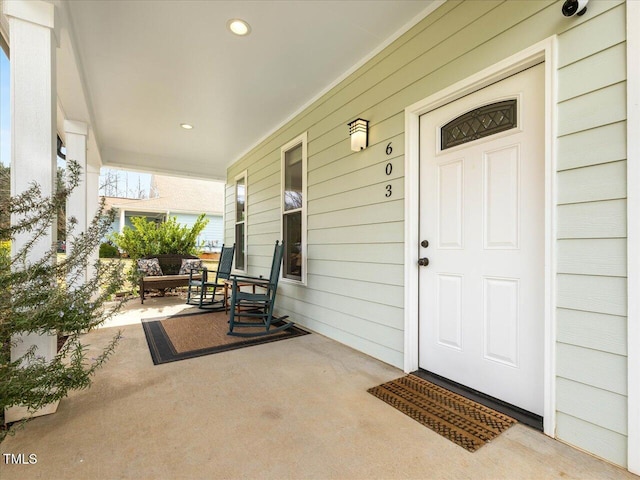 doorway to property featuring a porch