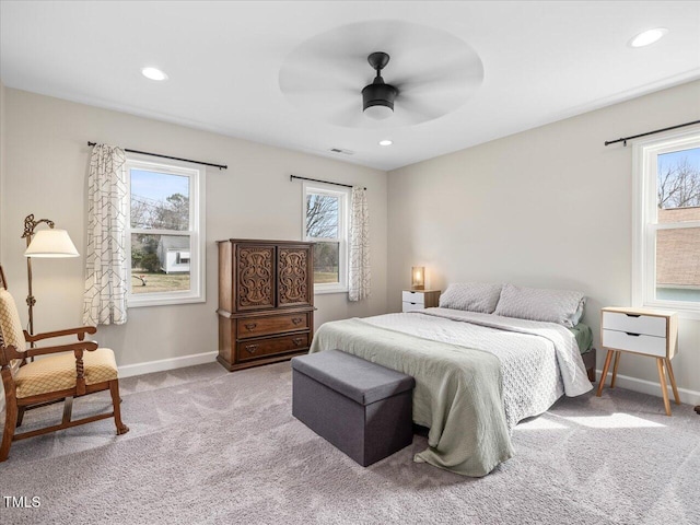 bedroom with recessed lighting, baseboards, and carpet floors