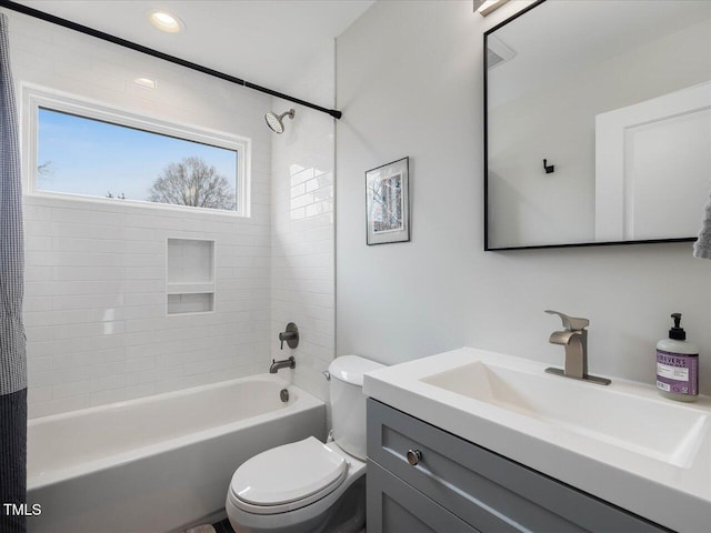 full bath with recessed lighting, toilet, vanity, and bathtub / shower combination