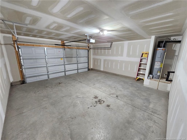 garage featuring a garage door opener and electric water heater