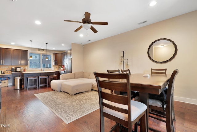 dining area with visible vents, baseboards, ceiling fan, recessed lighting, and dark wood-style floors