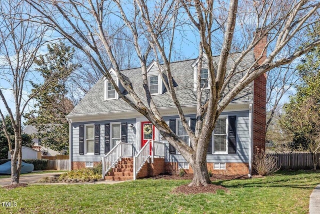 cape cod home featuring crawl space, a chimney, a front yard, and fence