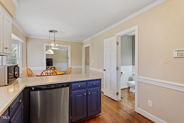 kitchen featuring wainscoting, a peninsula, wood finished floors, blue cabinets, and stainless steel dishwasher