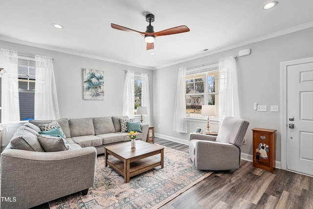 living room with recessed lighting, wood finished floors, baseboards, and ornamental molding