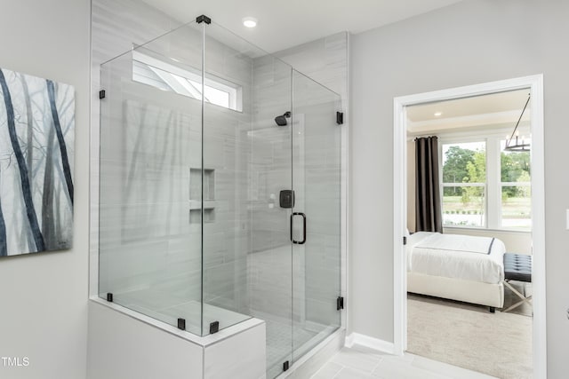 ensuite bathroom featuring recessed lighting, baseboards, a stall shower, and ensuite bathroom