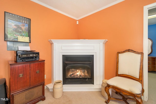 interior details with a glass covered fireplace, carpet flooring, and crown molding