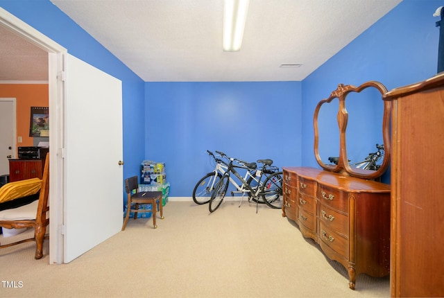 rec room featuring visible vents, baseboards, and carpet