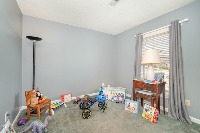 playroom featuring visible vents, baseboards, and carpet flooring