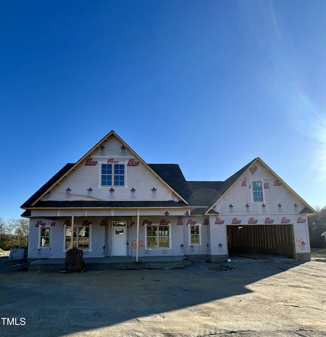 property in mid-construction with a porch