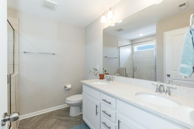 bathroom featuring a sink, visible vents, and a stall shower